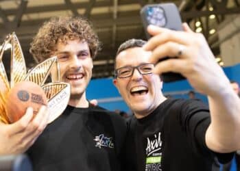 Jack Simpson and Dave Makin celebrate Jack winning the World Barista Championship. Image: Axil Coffee Roasters.