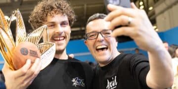 Jack Simpson and Dave Makin celebrate Jack winning the World Barista Championship. Image: Axil Coffee Roasters.