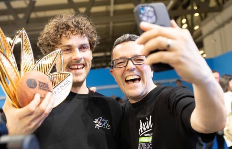 Jack Simpson and Dave Makin celebrate Jack winning the World Barista Championship. Image: Axil Coffee Roasters.