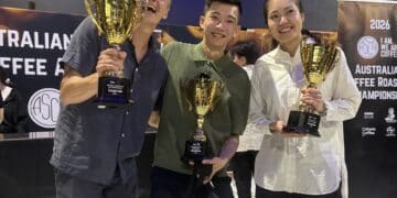 2026 ASCA National Specialty Coffee Champions Simon Gautherin, Gabrel Tan, and Amy Zhang.