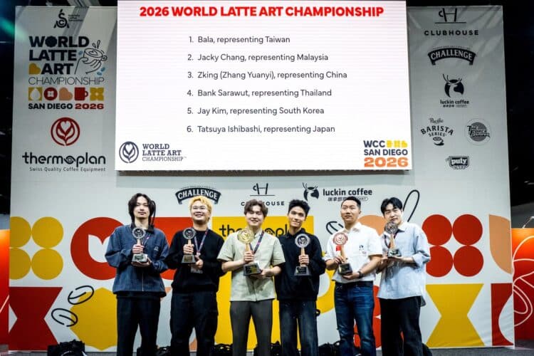Bala (third from left) celebrates winning the 2026 WLAC with the other podium finishers.