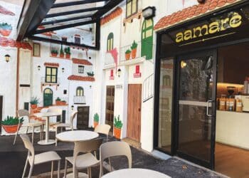 Aamare’s outdoor area features an ornate mural of Italian-style balconies.