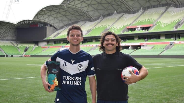 Melbourne Victory midfielder Louis D’Arrigo pictured alongside Roasting Warehouse Head of Brand, Alexander Paraskevopoulos. Image: Melbourne Victory.