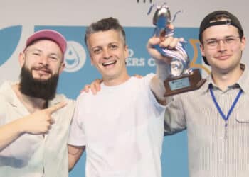 Carlos Escobar, Simon Gautherin, and Némo Pop celebrate a runner-up finish at the 2026 World Brewers Cup.
